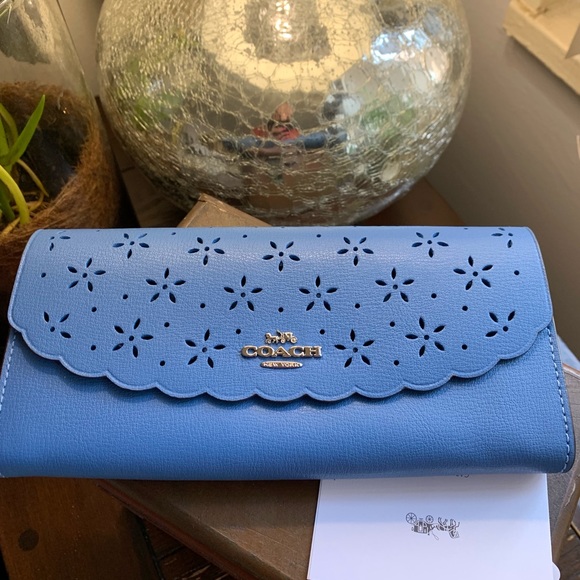 Coach Handbags - Authentic Coach perforated slim LG envelope wallet
